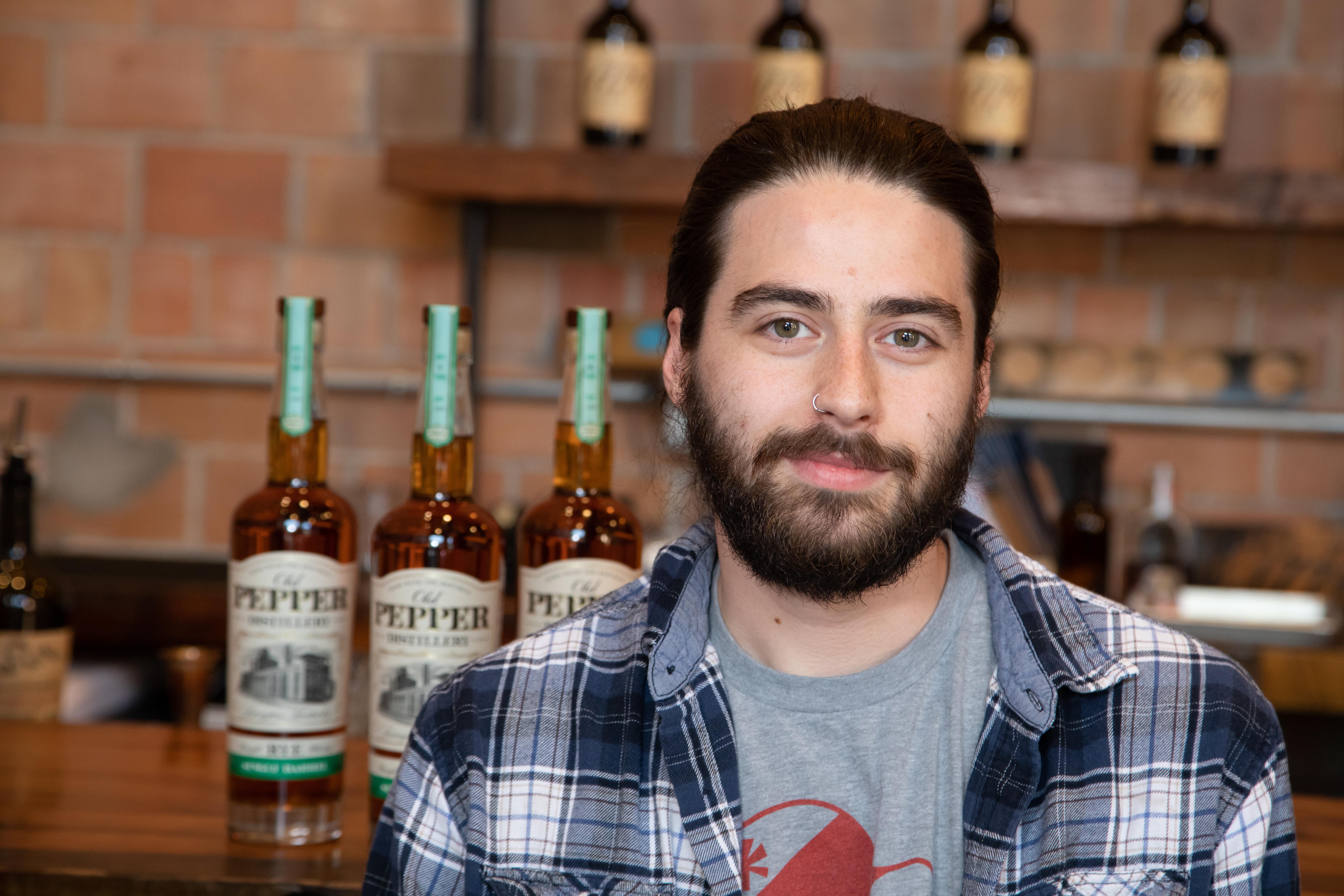 "Being part of something with a real, authentic history and authentic story definitely helps me put myself behind the product and the brand.” Cody Giles, head distiller for James E. Pepper Distillery. Photo by Stephen Patton.