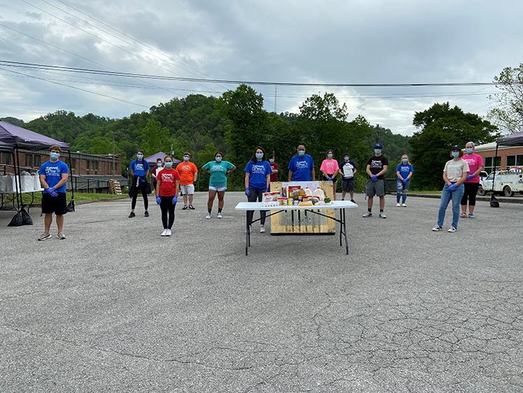 CANE Kitchen volunteers prepare to distribute meal kits. Photo by Valerie Horn. CANE Kitchen volunteers prepare to distribute meal kits. Photo by Valerie Horn.