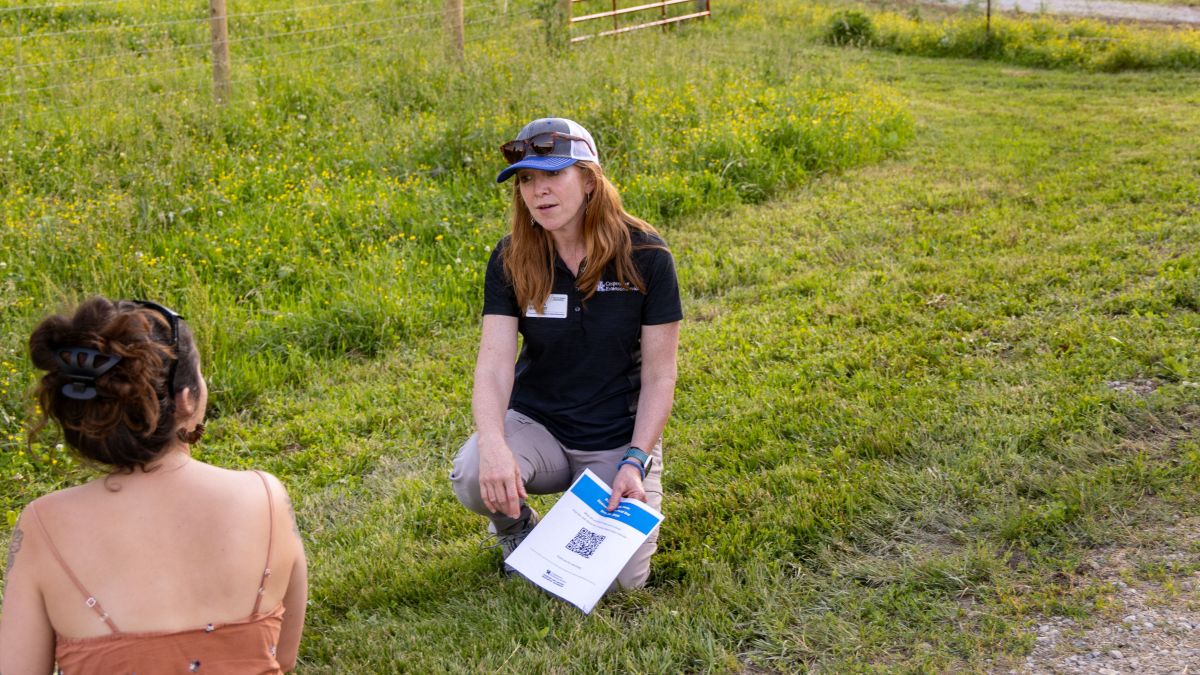 UK extension water quality specialist Amanda Gumbert interacting with an event participant. Photo by Matt Barton.