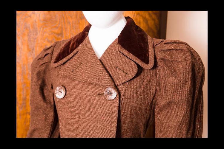 The top of Belle Brezing's brown walking suit. It is on display in UK's Erikson Hall. 