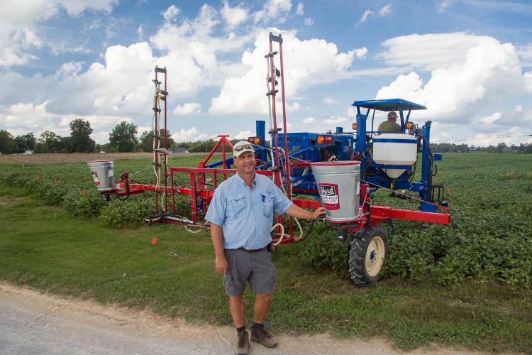 Edwin Ritchey, UK extension soils specialist, gets ready to seed a cover crop mixture into double-crop soybeans earlier this fall at the UK Research and Education Center in Princeton. Photo by Steve Patton, UK agricultural communications.