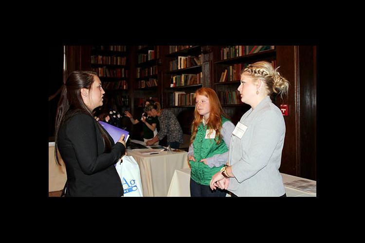 Two UK Ag Equine Program alums give advice to an attendee at the 2017 UK Equine Career and Opportunity Fair.