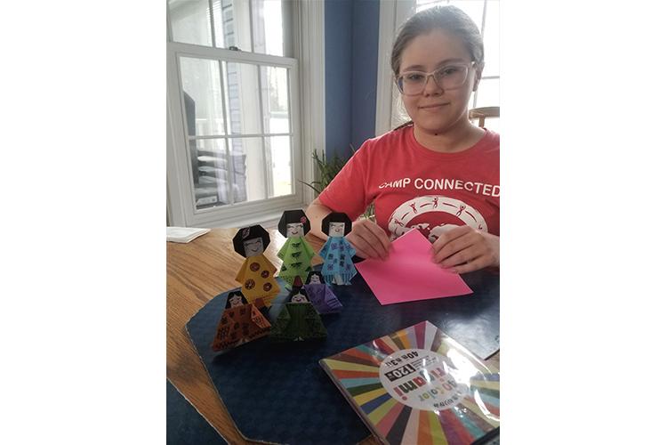 Russell County 4-H'er Autumn Onyon shows off the Hino dolls she made as part of 4-H's virtual celebration of Japan's Girl Day. 