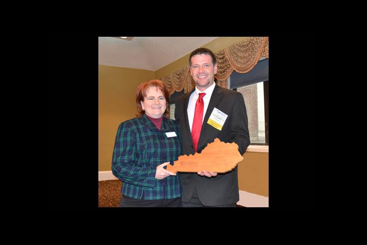 Renee' Williams was presented a Communicator of the Year plaque from KFIA President Darrin Gay.