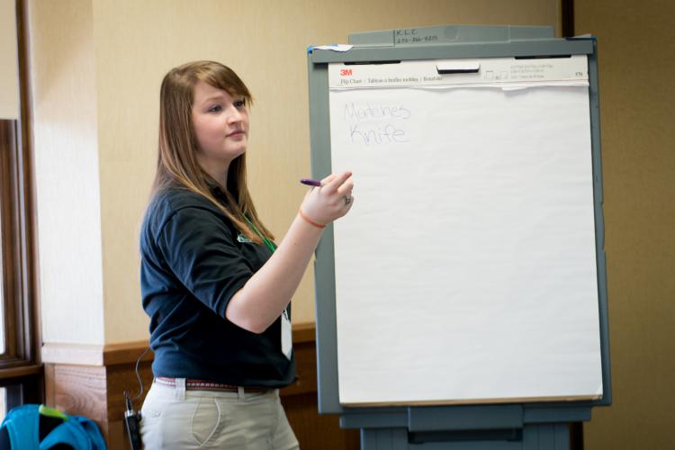 Courtney Rowland leads a workshop about disaster preparedness at Teen Summit 
