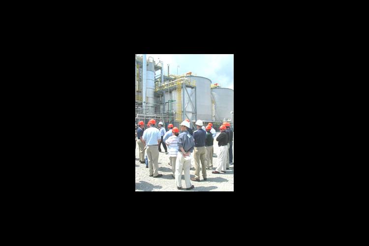 people with hard hats touring the Kentucky Ethanol Production Facilities