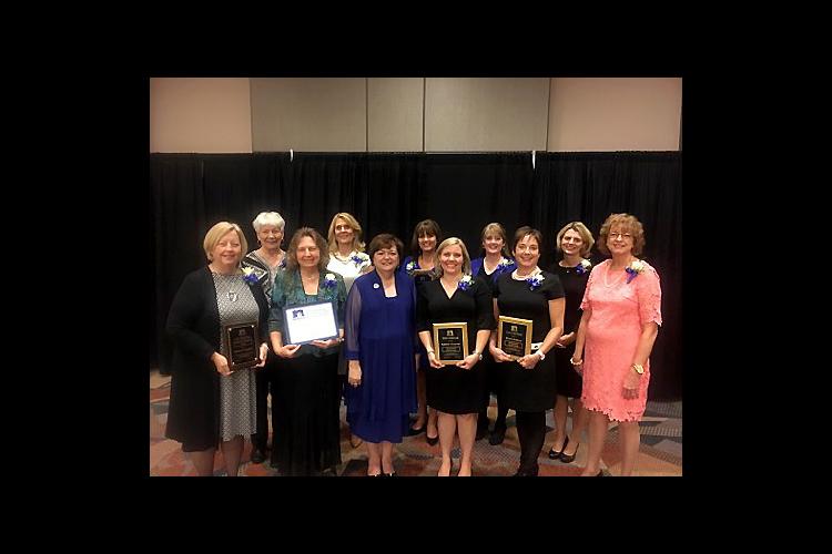 UK award winners post with Theresa Mayhew, NEAFCS president, front, third from left. 