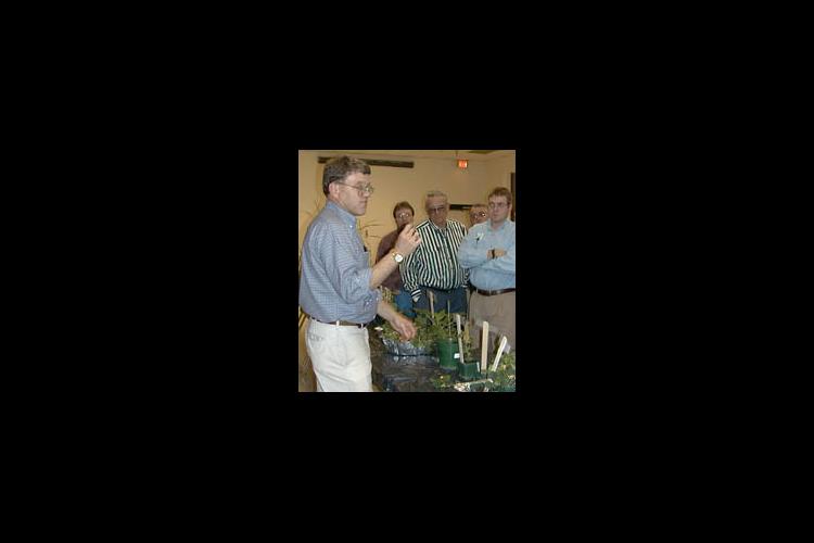 Jim Martin, UK Extension weeds science specialist, explains how to identify a pest at the 1999 IPM training school in Princeton, Ky.
