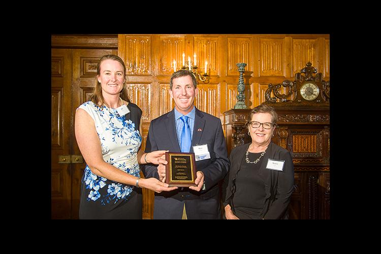 Jill Stowe, left, and Nancy Cox present Matt Koch with the Friend of UK Ag Equine Programs award. 