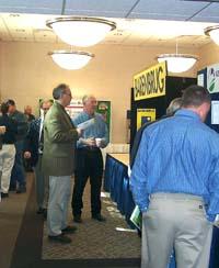 UK Extension Forage Specialist Jimmy Henning talks with visitors at the annual alfalfa conference in Cave City.
