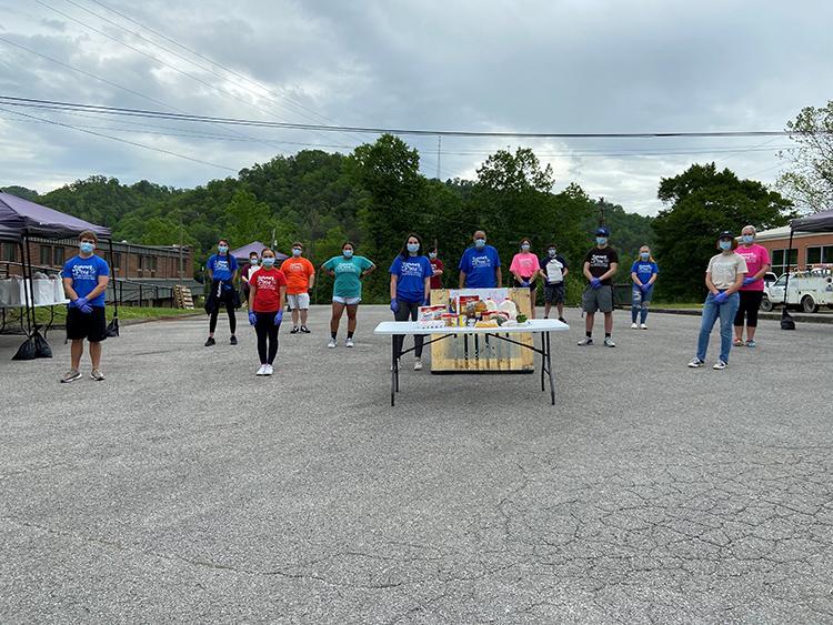 CANE Kitchen volunteers prepare to distribute meal kits. Photo by Valerie Horn.