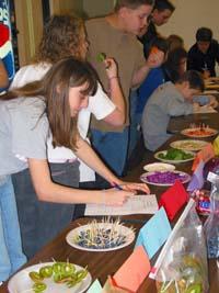 children sampling vegetables