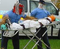 Scarecrows Paramedic Penny and EMT Tony proudly serve in front of the Fleming County EMS building.