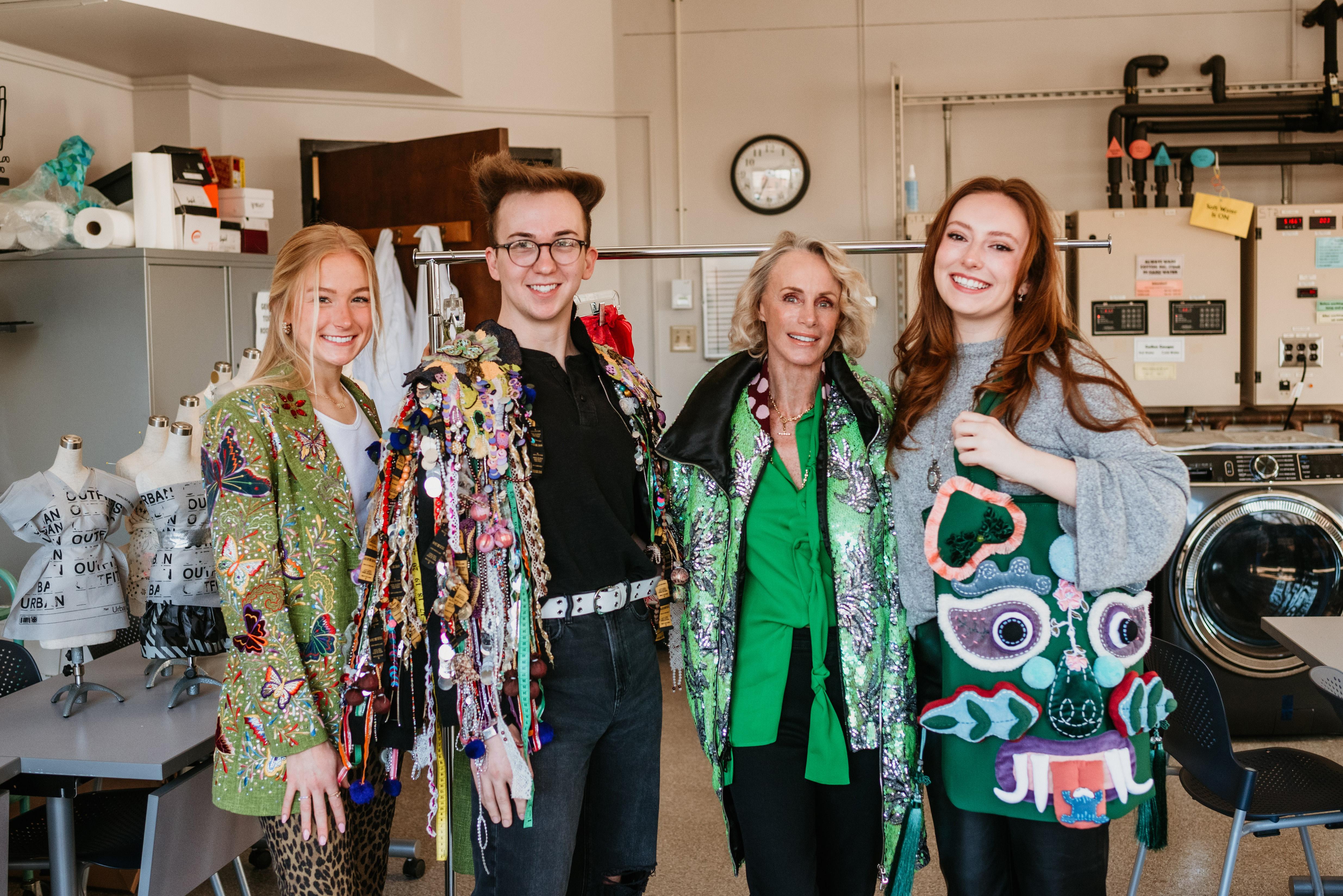 Elisabeth Goth, center right, with merchandising, apparel and textiles students Camille Downing, Briar Honeycutt and Emily Sheet wearing pieces from Goth’s collection.