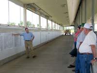 The walking tour of the Animal Science Beef Unit included a stop in one of the feeding facilities.