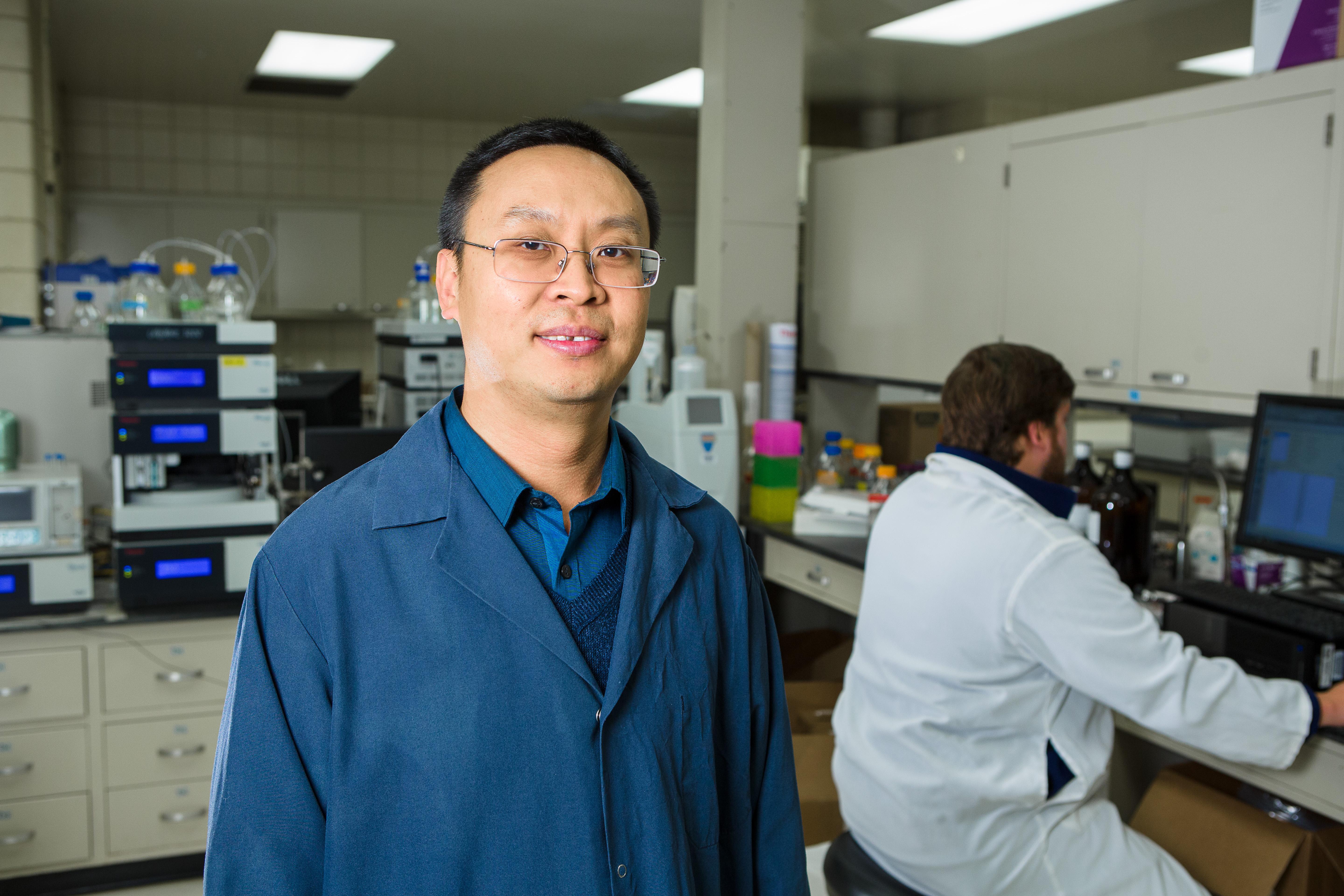Jian Shi is the lead researcher on the grant studying how to remove sulfur from pine byproducts used in biofuel production. Photo by Matt Barton, UK agricultural communications.