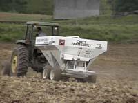 A western Kentucky farmer spreads a nitrogen fertilizer on his crop ground.