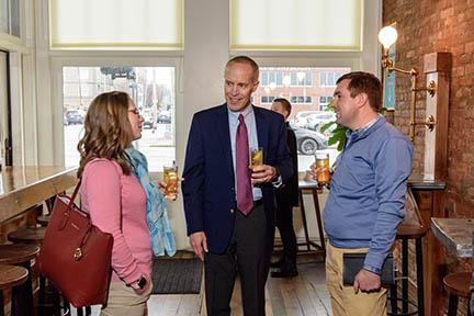 Stephanie Halcomb, Billy Van Pelt and Sam Halcomb chat during the American Farmland Trust Rye Lunch.