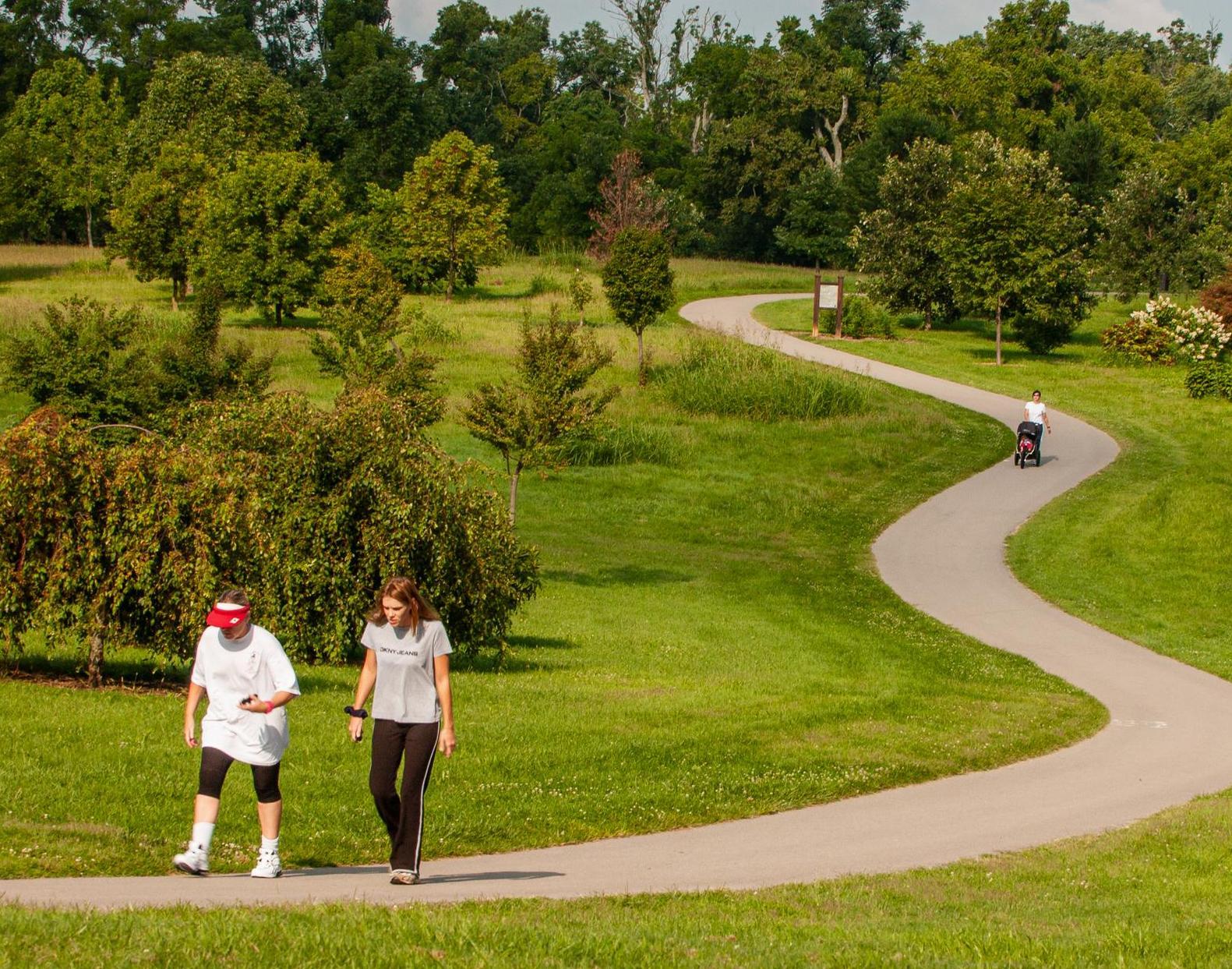 Walkers at the University of Kentucky's Arboretum.