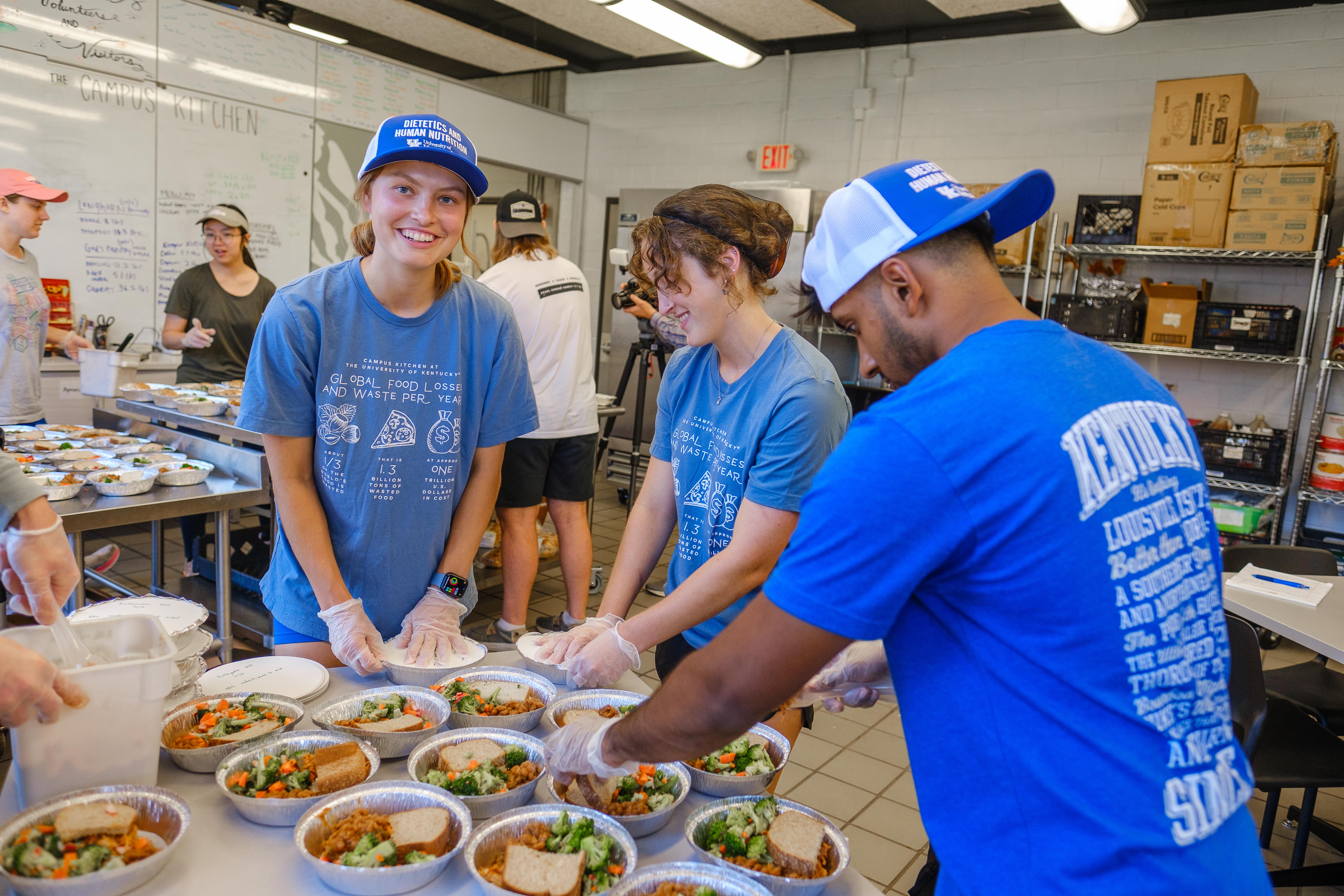 UK Dietetics students Olivia Kobal and Grace Wise in the Meals on Wings program prepared health meals with extra food from UK Healthcare Food Services