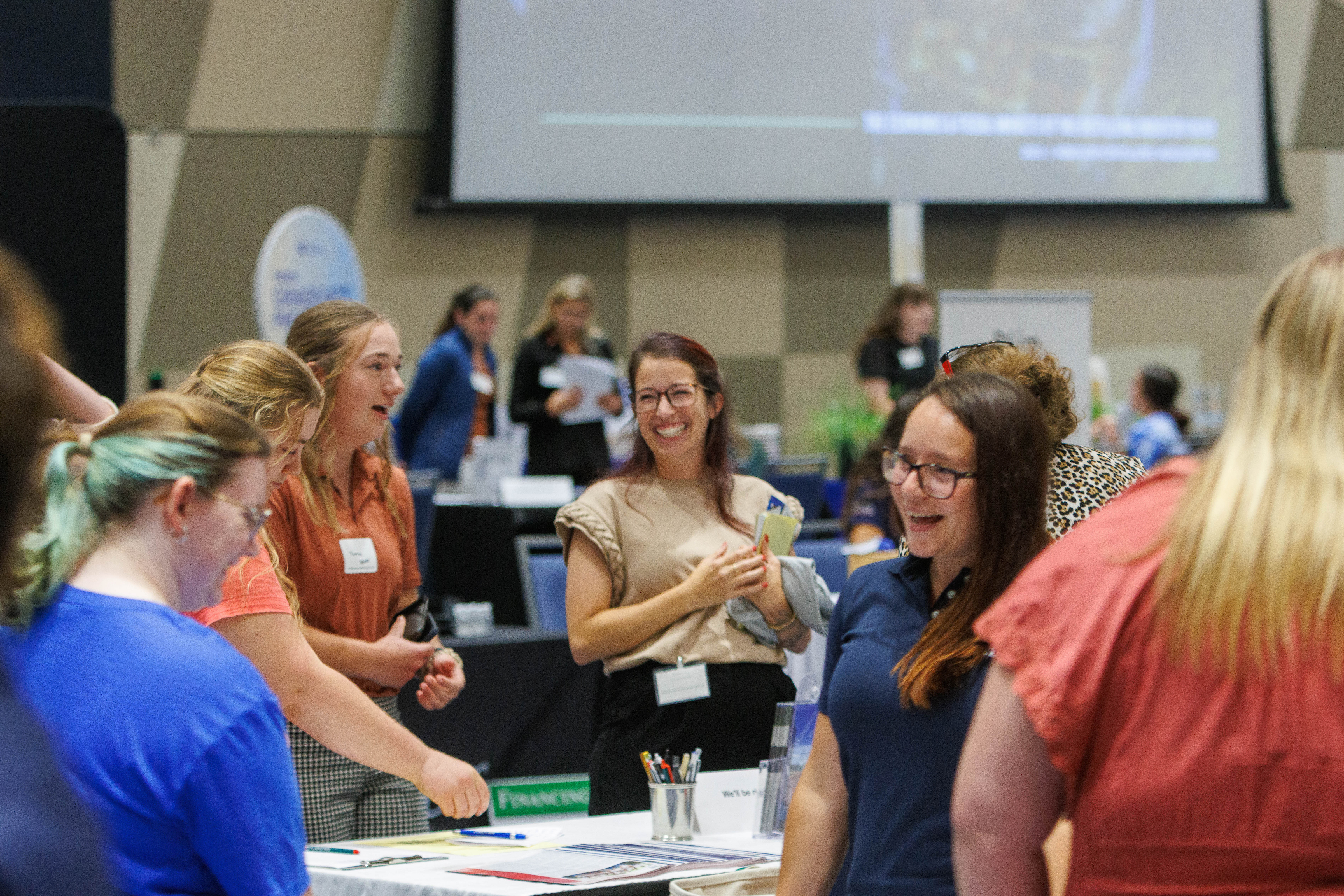 Students engaging with employers at the 2025 Kentucky Signature Industries Career Fair. Photo by Martin-Gatton CAFE.
