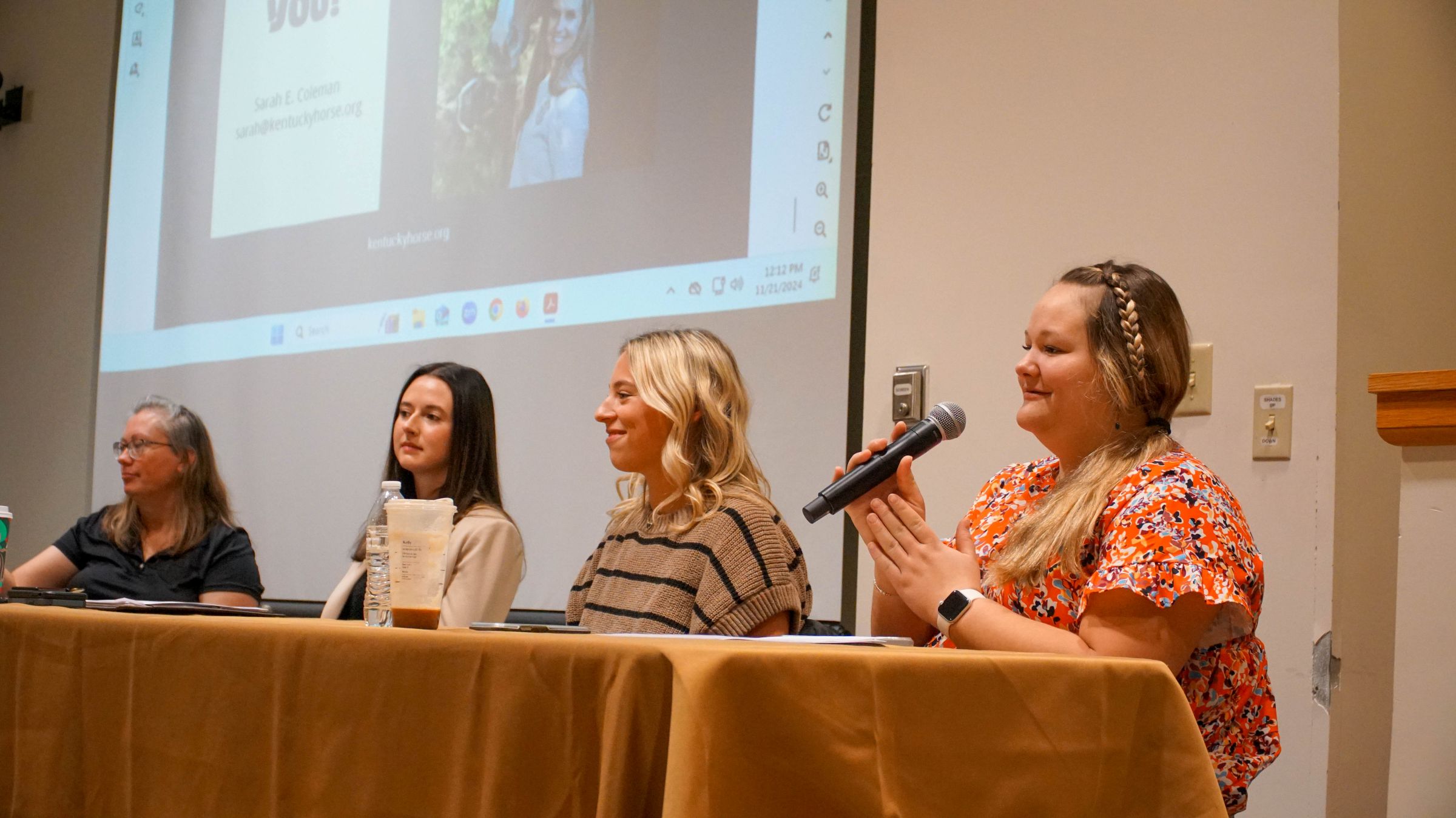 Peer Instructor, Jenna Morrow, moderating a panel of industry leaders. Photo provided by Zoey Ortega