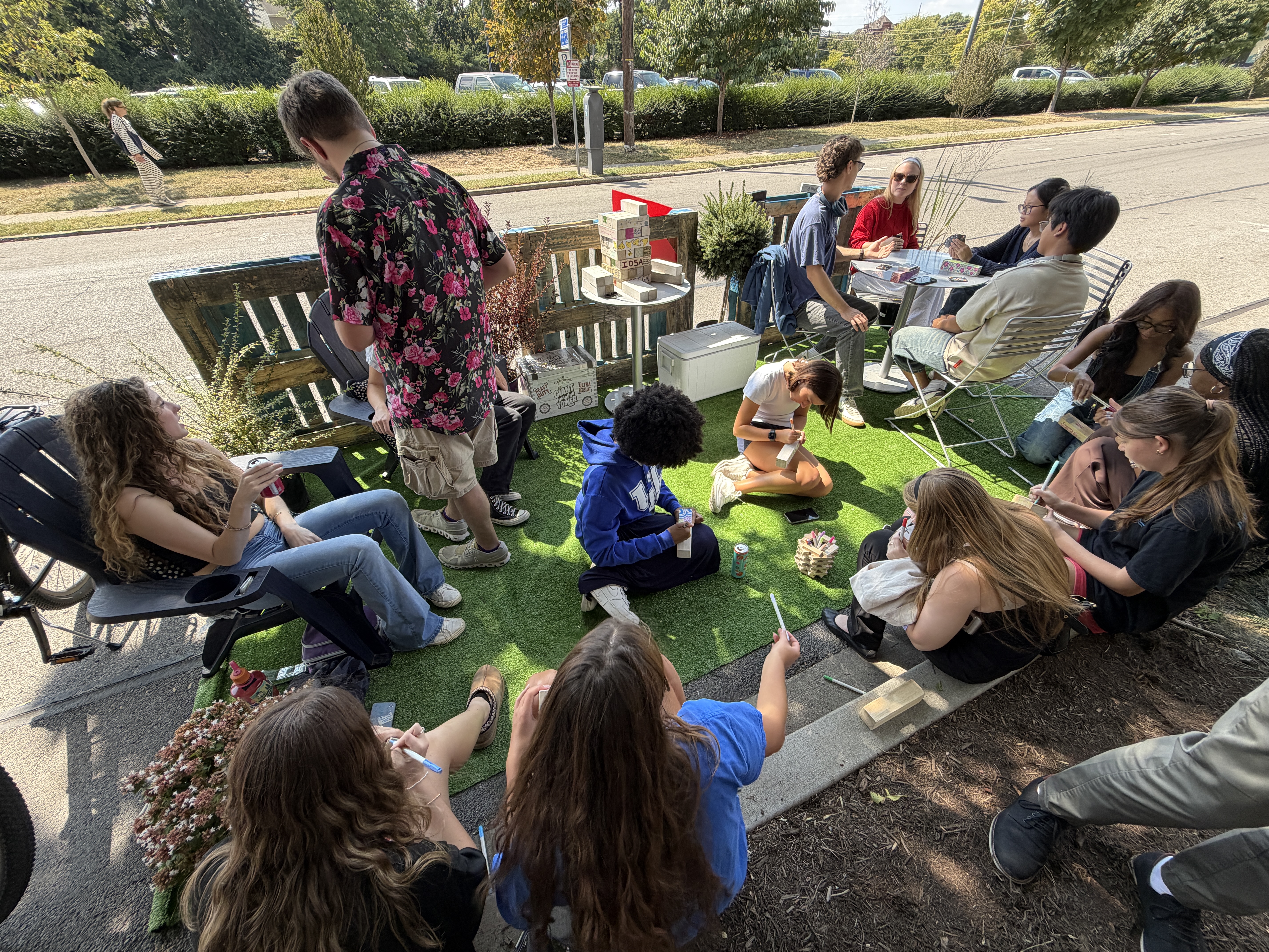 Organizers invited attendees to decorate their own Jenga block that then came together to form a full Jenga tower at the end of the event, effectively becoming a built object that symbolized the event’s collaborative theme. Photo provided by Haley Simpkins.