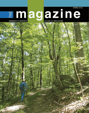 Cover photo of the AgMagazine for Spring 2013. Cover photo displays a person walking on a trail.