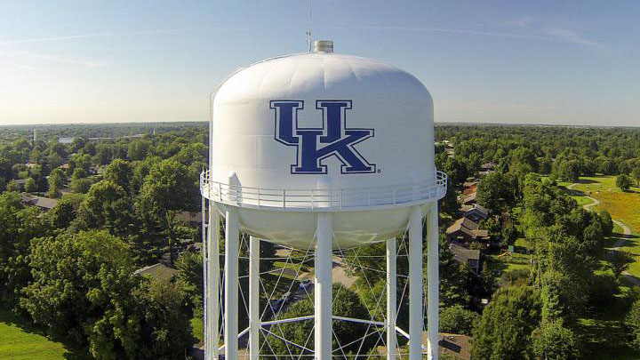 A water tower with the UK logo