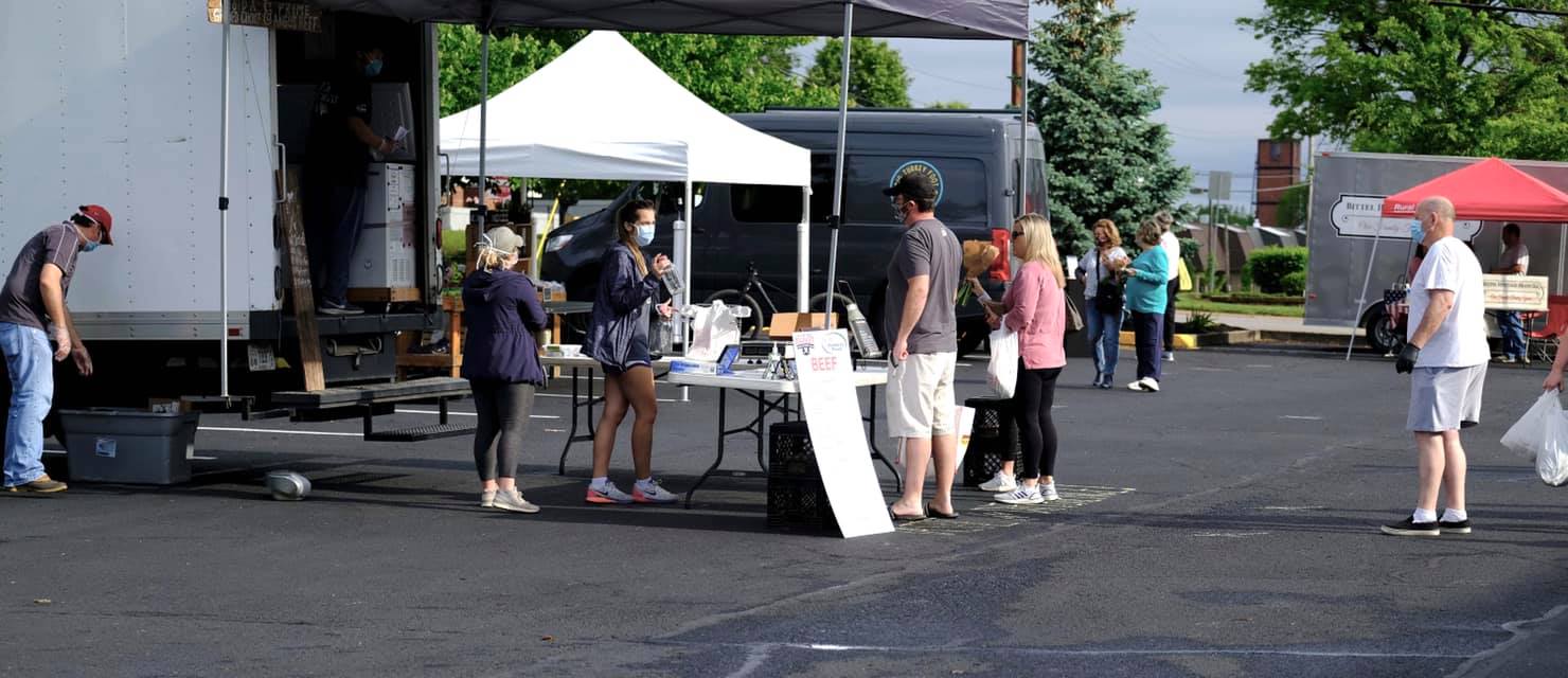 The Owensboro Regional Farmers Market initiated measures to keep their customers and vendors safe, including appropriate spacing, disinfecting and the wearing of masks. Photo by Kim Jargoe