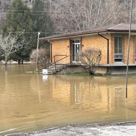 The main office building at UK's Robinson Center for Appalachian Resource Sustainability during flooding brought by torrential rains. Photo by Daniel Wilson