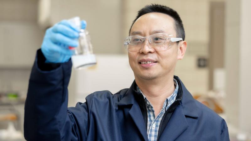 Awarded $2.12 million from the DOE, Jian Shi, Ph.D., is leading a multi-institutional team to create sustainable jet fuel while reducing landfill waste. Photo by Sabrina Hounshell.