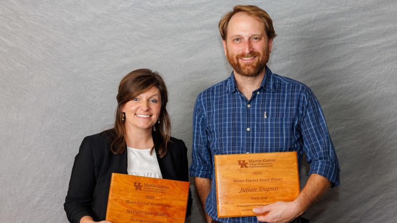 Savannah Robin (left) and Julian Dupuis (right) pictured holding their Master Teacher awards. Photo by Matt Barton.