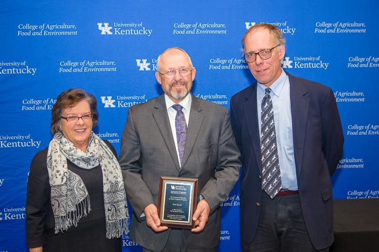 Nancy Cox, UK CAFE dean,  Mick Peterson, right,  director of UK Ag Equine Programs, present the Friend of UK Ag Equine Programs award to Fred Sarver. Photo by Matt Barton, UK agricultural communications.