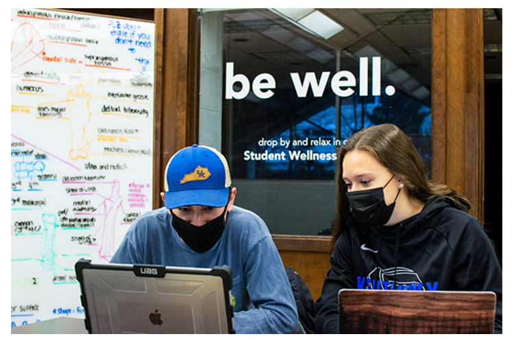 CAFE students Mason DiSalvo and Sierra Tichnell sit outside of the new student wellness room in Ag North.