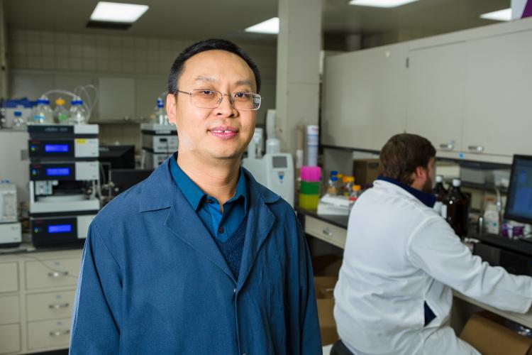 Jian Shi is the lead researcher on the grant studying how to remove sulfur from pine byproducts used in biofuel production. Photo by Matt Barton, UK agricultural communications.