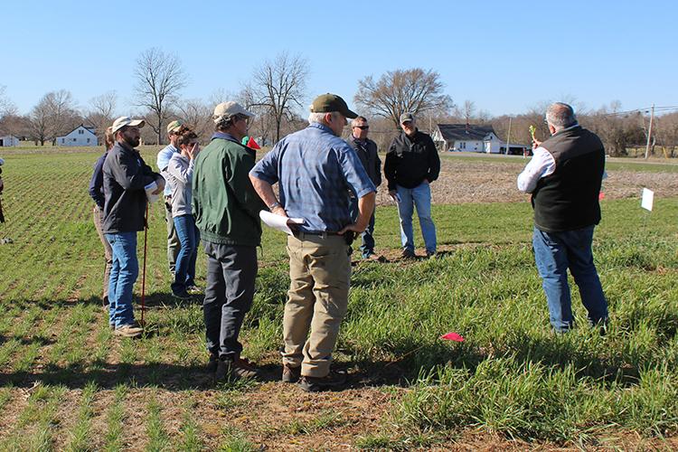 Forage extension specialist Chris Teutsch, right, speaks to participants about forages at a previous UK event. Photo courtesy of KATS. 
