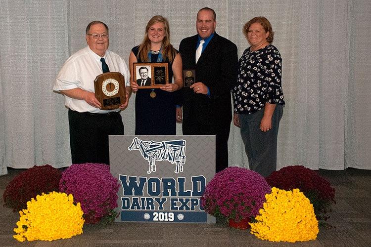 From left: Dr. Dave Selner, executive director of the National Dairy Shrine, UK student Madison Dyment,  Derek Nolan, UK graduate student and team coach, and  Larissa Tucker, UK senior extension associate for Dairy Youth Programs. Photo submitted. 
