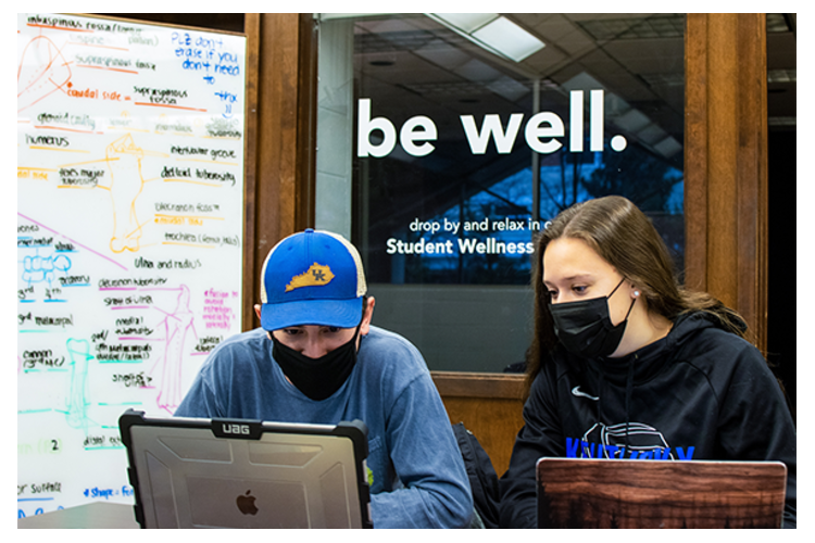 CAFE students Mason DiSalvo and Sierra Tichnell sit outside of the new student wellness room in Ag North.
