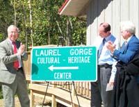 Transportation Sec. James Codell joins State Rep. Rocky Adkins and State Sen. Walter Blevins in opening the center.