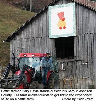 Gary Davis stands outside his barn