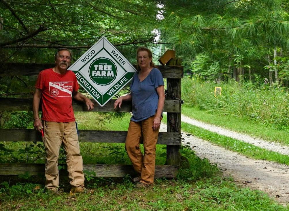 Phil Traxler, left, and Laurie Yanoshek, right, have been named Kentucky Tree Farmers of the Year.